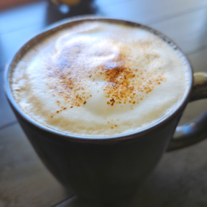 Coffee with espresso powder on top